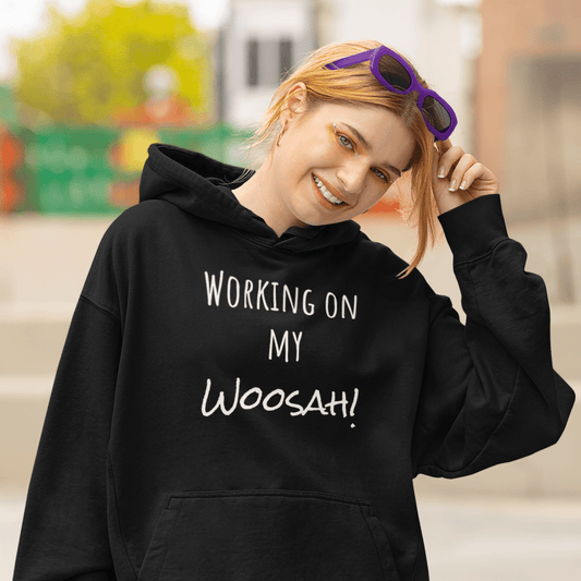 Girl wearing a Working On My Woosah (Words Only) Hoodie