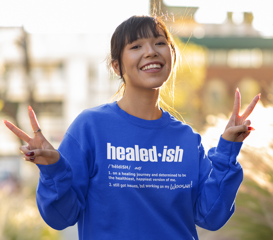 woman wearing a healed-ish definition long-sleeve t-shirt