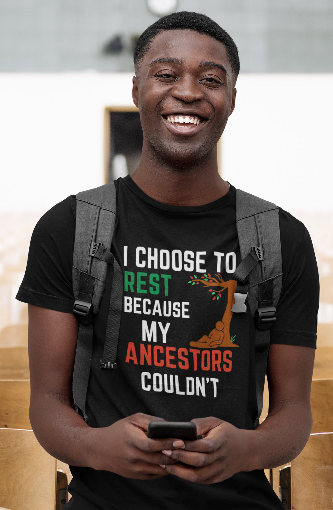 Young man wearing an I Choose To Rest t-shirt